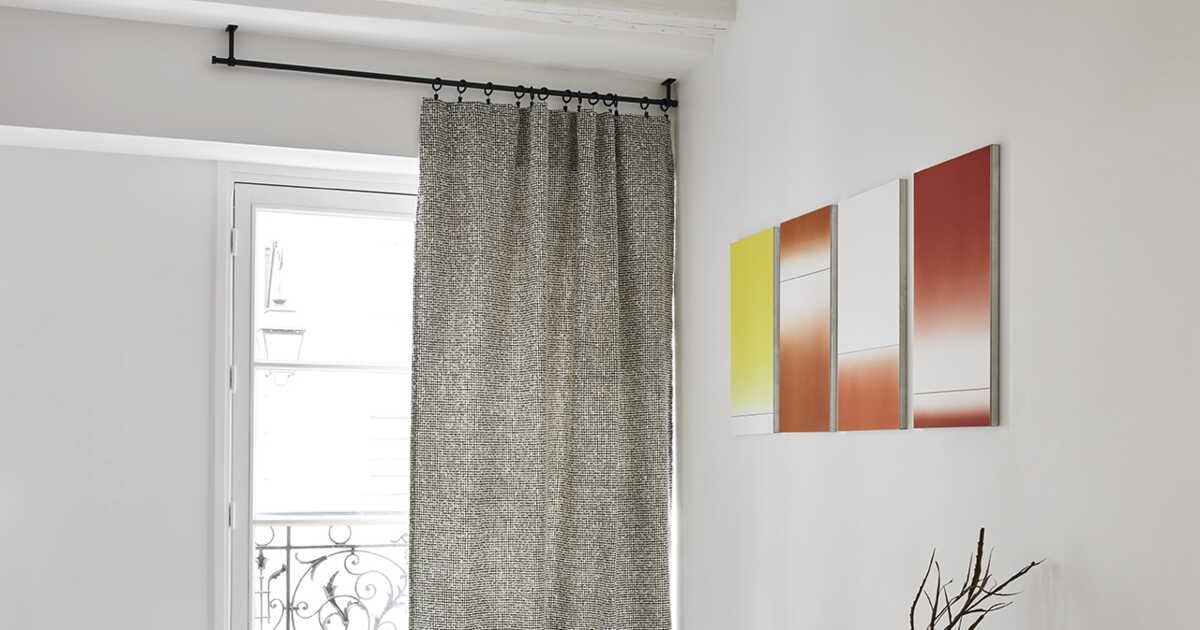 Des supports variés pour vos rideaux : tringles, câbles et rails